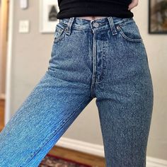 Vintage Levi 17501 jeans in a medium subtle stone wash. Button fly. Tapered/fitted leg. 100% cotton SIZING: Tagged size: 5 Actual waist: 12.5" across lying flat Recommended for: 24 (relaxed) or 25 (snug) waist. Rise: 10.25" Across hips: 18.5" Inseam: 31" In good preloved shape with no stains/rips. Some wear to patch on back. See pics for best description. For reference, I am wearing in photos. My waist is approx. 25.5" and I am 5'7". Classic Washed Blue Mid-rise Cropped Jeans, Classic Mid-rise Washed Blue Cropped Jeans, Classic Mid-rise Cropped Jeans In Washed Blue, Classic Dark Wash Washed Flare Jeans, Classic Washed Blue Cropped Denim Jeans, Classic Washed Blue Cropped Jeans, Classic Flare Jeans In Medium Wash Recycled Denim, Stonewashed Fitted Denim Bottoms, Fitted Stonewashed Denim Bottoms