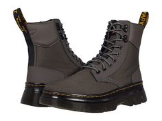 Dr. Martens Tarik - Shoes : Gunmetal Extra Tough 50/50/Ajax : An iconic combat boot silhouette, the Dr. Martens Tarik boots pair easily with your favorite denim and feature a genuine leather upper. Tall, lace up boot with pull tab at heel and round toe. Textile lining and insole. Durable synthetic outsole. Imported. Measurements: Heel Height: 1 1 2 in Weight: 1 lb 14 oz Platform Height: 8 in Product measurements were taken using size UK 8 (US Men's 9, US Women's 10), width Medium. Please note th Fall Outdoor Lace-up Boots With Reinforced Heel, Rugged Insulated Lace-up Combat Boots, Lace-up Moto Boots For Outdoor Work In Fall, Fall Outdoor Work Lace-up Moto Boots, Insulated Lace-up Combat Boots For Hiking, Rugged Combat Boots With Reinforced Heel For Winter, Fall Combat Boots With Reinforced Heel For Outdoor, Casual Winter Combat Boots With Reinforced Heel, Fall Outdoor Combat Boots With Reinforced Heel