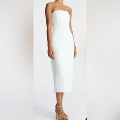 The Elizabeth Dress, A Part Of A.L.C.'S Signature Collection, Is Impeccably Cut From Structured Winter White Fabric. This Midi Silhouette Is Strapless, Featuring Pockets And Darted Seams For A Feminine Fit. We Recommend To Size Up One From Your Typical Size White Knee-length Strapless Formal Dress, Spring Dinner Dress With Straight Neckline, Fitted Midi Strapless Dress For Dinner, Fitted Midi Length Strapless Dress For Dinner, Fitted Strapless Midi Dress For Dinner, Summer Midi Dress With Straight Neckline For Dinner, Spring Strapless Midi Dress For Dinner, Summer Strapless Fitted Dinner Dress, Chic Strapless Dress With Fitted Bodice For Dinner