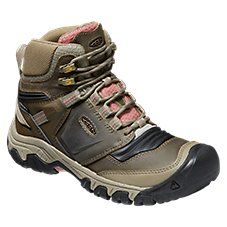 A supportive hiking boot for adventures over tough, rocky trails, KEEN\u00ae Ridge Flex Mid Waterproof Hiking Boots for Ladies come ready for any trek. Waterproof leather and breathable mesh uppers keep feet dry and protected, thanks to quick-dry linings and KEEN.DRY\u2122 waterproof/breathable membrane protection inside. Removable polyurethane footbeds and compression-molded EVA midsoles offer long-lasting, fatigue-fighting cushioning, stability, and support over long-distance treks. KEEN's hee Rugged Waterproof Boots For Outdoor Activities, Rugged Weatherproof Work Boots For Camping, Weatherproof Leather Boots For Camping, Gore-tex Hiking Boots For Walking, Rugged Waterproof Boots For Camping, Rugged Lace-up Waterproof Boots For Camping, Waterproof Round Toe Work Boots For Camping, Waterproof Lace-up Hiking Boots For Camping, Insulated Round Toe Work Boots For Adventure