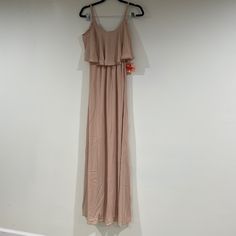 The Caitlin Ruffle Maxi Dress Dusty Blush Crisp And Flows From Top To Bottom. She's Extremely Versatile, So Wear Her As A Classic Spaghetti Strap Or Make Her Into A Cold Shoulder! Summer Fitted Bridesmaid Ruffle Dress, Spring Bridesmaid Fitted Ruffle Dress, Spring Bridesmaid Ruffle Dress With Ruffle Hem, Spring Bridesmaid Ruffle Dress, Bridesmaid Maxi Dress With Ruffle Hem, Beige Flowy Tiered Maxi Dress, Fitted Beige Maxi Dress With Ruffles, Summer Bridesmaid Ruffle Dress, Spring Evening Flowy Ruffle Dress