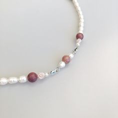 This beaded baroque pearl necklace can be styled as rope necklace, lariat necklace, classic necklace, or even a bracelet. Create your own Return to Origin style with your favourite chains, tassels, and pendants. ⚜ Return to Origin Beaded Pearl Beaded Chain ❀ Natural Fresh Water Pearl Pearl 5-9mm❀ Sterling Silver Spacer, Rings, and Clasp❀ Wood Beads with Vintage Pattern❀ Rhodochrosite Beads 10mm❀ Beaded Chain 42 in. with White Glasses Chain Connectors❀ Multiple Styles May this necklace bring you Adjustable Single Strand Baroque Pearl Necklace, Pearl White Beaded Necklaces For Jewelry Making, Long Pearl Necklace With Gemstone Beads, Pearl Charm Crystal Necklaces With Round Beads, Single Strand Pearl Necklaces For Jewelry Making, Single Strand Pearl Beads As Gift, Single Strand Pearl Beads For Gifts, Pearl Crystal Necklaces With Round Beads, Adjustable Single Strand Baroque Pearl Beaded Necklaces