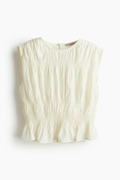 Fitted  sleeveless top in woven fabric. Round neckline  smocked sections and gathered seam at shoulders for a ruched effect  and a concealed zipper at back. Gently flared hem. Cotton lining. Sleeveless Cotton Blouse With Smocked Back, Baby Gym, Smocked Top, Cardigan Sweater Dress, Street Look, Mode Inspo, School Fits, Senior Pics, Maternity Wear