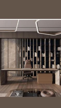 an office with a desk, bookshelf and bookcases in the background