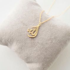 This necklace is a piece of our new collection of Allah necklace made from sterling silver and 14k gold. The collection includes different designs that suit all tastes Kufi/calligraphy, heart/rectangle/triangle shapes, tiny/big sizes. Here is the link for the full collection: https://etsy.me/2Swd0lPAll the designs can be made as necklace, bracelet, and earrings. If you also want a complete set that includes a necklace, a bracelet and earrings please get in touch with us. We accept custom orders! Kufi Calligraphy, Allah Necklace, Calligraphy Heart, Allah Pendant, Photographing Jewelry, Arabic Jewelry, Islamic Jewelry, Crescent Necklace, Coffee Photos