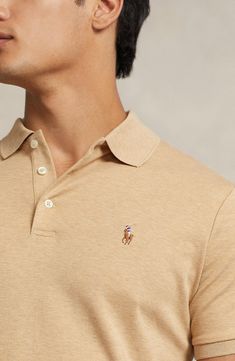 Rider embroidery subtly brands a short-sleeve polo cut from soft, breathable cotton for all-day comfort in classic style. 29" length (size Medium) Spread collar Short sleeves 100% cotton Dry clean or machine wash, tumble dry Imported Fitted Casual Polo Shirt With Spread Collar, Classic Beige Polo Shirt, Classic Beige Polo Shirt With Collared Neckline, Classic Beige Collared Polo Shirt, Classic Brown Polo Shirt With Collared Neckline, Classic Brown Polo Shirt, Fitted Beige Short Sleeve Polo Shirt, Beige Relaxed Fit Polo Shirt, Classic Fitted Beige Polo Shirt