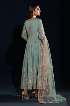 Aqua Blue Embellished Frock Pakistani Party Dress embraces tradition in this aqua-hued kalidar frock jeweled with hand adda embellishments on the bodice. Embellished Anarkali Set For Festivals, Festival Embellished Anarkali Set, Festive Embellished Anarkali Set, Embellished Anarkali Set Maxi Length, Embellished Anarkali Set In Maxi Length, Anarkali Embellished Churidar For Reception, Blue Embellished Georgette Anarkali Set, Blue Churidar With Mirror Work For Reception, Blue Embellished Sharara For Eid