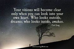 a person standing under a tree with the words, your vision will become clear only when you can look into your own heart