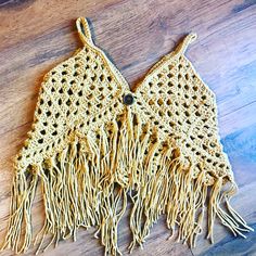 An adorable child boho vest to spice up any outfit. Hippie Sleeveless Crop Top For Music Festival, Fitted Bohemian Brown Crop Top, Bohemian Cotton Crochet Top, Bohemian Cotton Crochet Top For Spring, Bohemian Cotton Crop Top Tank, Bohemian Cotton Crop Top Tank Top, Sleeveless Cotton Crochet Top For Fall, Bohemian Beige Crochet Top For Festival, Beige Bohemian Crochet Top For Festivals