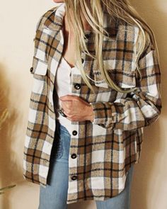 Bundle up in this cozy & comfortable shirt jacket. Made from the cutest woven plaid in tones of taupe, white & black. Perfectly oversized, this jacket has faux front pockets to ensure it does not look to bulky. Model is wearing a size small. So cute paired with jeans & boots & perfect layered for chilly weather. Color: Taupe, white & black Soft poly & cotton blend Hand wash cold Because of the time invested in each piece, all sales are final. Ships from our small family store in Washington State Fall Flannel Shirt With Button Closure, Trendy Button-up Flannel Shirt For Fall, Trendy Fall Flannel Button-up Shirt, Trendy Fall Button-up Flannel Shirt, Brown Relaxed Fit Flannel Shirt For Fall, Plaid Flannel Shirt For Fall With Button Closure, Cozy Button-up Shacket For Everyday, Long Sleeve Flannel Shirt With Snap Buttons For Fall, Brown Flannel Shirt With Relaxed Fit For Fall