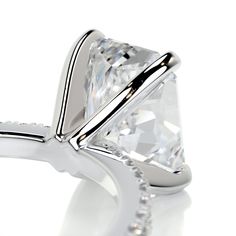 This is why radiant cuts are so popular! They give the most modern twist to classic rectangular cuts.Here is our 2.3-ctw radiant F VS2 engagement ring finished with a band of icy white diamonds.This has her name all over it.2 Carat Radiant F VS2 Diamond with an additional of 0.3 Carat Diamonds on the sides. This Ring is Certified by a Third Party Gemological institute 3 Carat Ring, Special Engagement Ring, Timeless Engagement Ring, Measure Ring Size, 3 Carat Diamond, Vs2 Diamond, Pave Engagement Ring, Types Of Diamonds, Engagement Rings Platinum