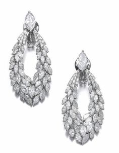 Baguette Diamond Teardrop Jewelry, Teardrop Baguette Diamond Fine Jewelry, Luxury Oval Diamond Earrings For Evening, Luxury Marquise Diamond Earrings, Luxury Marquise Formal Earrings, Designer Jewelry With Baguette Diamonds For Wedding, Designer Wedding Jewelry With Baguette Diamonds, Luxury Marquise Diamond Earrings For Evening, Luxury Baguette Diamond Earrings For Formal Events