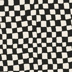 a black and white checkered pattern on fabric