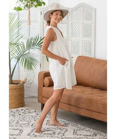 Sunny days are around the corner, and our cotton voile floral embroidered mini dress is the perfect style to soak up the sun! Featuring a breezy sleeveless style with a v-neckline with braided detail, a loose body, and pockets. Pop it on over your swimsuit for an easy yet chic cover-up, or pair it with. sneakers or slip-on mules for the ultimate casual California vibe. Relaxed fit Sleeveless V-Neckline with braided detail Mini length Side pockets Model is 5'4, wearing a size S. Contents: 100% Co Small Clouds, California Vibe, Embroidered Mini Dress, Soak Up The Sun, Cloud White, Perfect Style, Pop It, Cotton Voile, Around The Corner