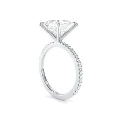 *Note that a gallery rail will need to be added on stone sizes 8.5mm and above Design DetailsThe Tara Ring is crafted with your selection of a moissanite or a lab grown diamond center stone and features round lab grown diamond accents. This ring is available in your choice of 18k gold or platinum. Browse #TheTaraRing hashtag on Instagram for additional photo and video footage. SpecificationsRender depicting an 8mm Princess TrueGem Moissanite. TrueGem Moissanite (D-F color, VVS1-VS1 clarity) or White Radiant Cut Lab Grown Diamond Ring, Radiant Cut Diamond Ring In Diamond White, Radiant Cut Lab Grown Diamond Ring With Center Stone, Princess Cut Moissanite Promise Ring, Fine Jewelry Radiant Cut Diamond Ring With Center Stone, Moissanite Princess Cut Promise Ring, Radiant Cut Brilliant Lab Grown Diamond Ring, Radiant Cut Lab Grown Diamond Jewelry For Promise, Solitaire Moissanite Jewelry In Round Cut