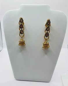 Beautiful bollywood indian pakistani dangle drop earring gold and shampagne colour the colours and design of the earrings make it very stylish and unique and gorgeous and luxurious features make it perfect for wedding mehndi and any evening  parties included  1 pairs of earring The item will come with the clear plastic bag and packaging. kindly wipe and store the jewellery in a plastic container after use. keep away from perfume for the jewellery to retain its shine. Please keep in mind that the Elegant Latkans Earrings For Formal Occasions, Elegant Dual-tone Jhumkas For Diwali, Elegant Dual-tone Jhumkas For Festive Occasions, Elegant Dual-tone Danglers For Festive Occasions, Elegant Festive Latkans Earrings, Dual-tone Chandbali Jewelry For Party, Temple Jewelry Style Gold Plated Drop Bridal Earrings, Gold Plated Drop Earrings For Bridal Temple Jewelry, Gold Plated Drop Bridal Earrings In Temple Style