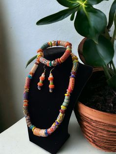 Make a Bold and Beautiful Statement with any variation of the Krobo!  Krobo beads are handmade with finely ground  recycled glass that is baked, molded and then  hand painted. Set includes:  Necklace                           Bracelet                           Earrings  Handmade in Ghana with love ❤️ Krobo Beads, Recycled Gifts, Tootsie Roll, Bold And Beautiful, Recycled Glass, Necklace Bracelet, Chain Styles, Artisan Jewelry, Beaded Necklaces