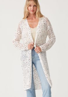 A vintage-inspired crochet knit cardigan in an ivory speckled knit. Crochet cardigan Speckled knit Relaxed fit Long sleeve Drop shoulder Mid-length Open front Vintage-inspired Lightweight bohemian cardigan Our best-selling crochet cardigan is back in a chic speckled knit. With long sleeves, a versatile mid-length, and an open front. The perfect light layer for the beach or running errands, we love to layer it over jeans and a simple tank top. Model is 5'9, wearing a size S.Style: I-51015K-SPA Cream Pointelle Knit Spring Cardigan, Spring Cozy Pointelle Knit Cardigan, Cozy Spring Pointelle Knit Cardigan, White Knit Cardigan For Spring, White Pointelle Knit Cardigan For Layering, Spring Textured Knit White Outerwear, Spring White Textured Knit Outerwear, Long Knit Sweater For Spring, Spring Cream Textured Knit Outerwear