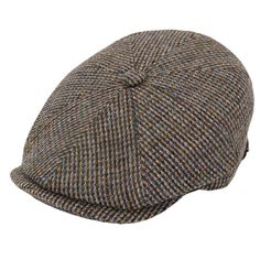 a brown and blue plaid hat on a white background