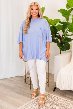 Embrace comfort and style effortlessly with this top! This spring blue versatile top is perfect for a casual day out on the town, and can be easily paired with skinnies or leggings! The raw hemlines adds a touch of uniqueness to your look! Get ready to feel comfortable and confident in this top! 100% Cotton Chic Relaxed Fit Top With Frayed Hem, Chic Tops With Frayed Hem And Relaxed Fit, Trendy Tops With Frayed Hem For Day Out, Casual Blue T-shirt For Layering, Blue T-shirt For Summer Layering, Casual Top With Frayed Hem For Day Out, Light Wash Tops For Loungewear, Trendy Blue Tops For Loungewear, Casual Tops With Frayed Hem For Day Out