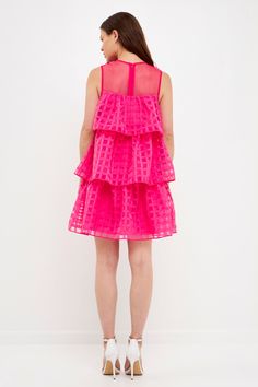 Sheer elegance. This tiered mini is made from sheer gridded organza for a look that's both elegant and stylish. The sleeveless bodice and lining make it perfect for warmer weather occasions. Dress it up or down - either way, you'll love the look of this pretty little mini. Gridded organza Sleeveless Tiered bodice Lined Mini length Hand wash cold Do not bleach Do not tumble dry Iron low Shell: 100% Polyester Contrast: 100% Polyester Lining: 100% Polyester HN927D Total length: 34.50" Bust: 36" S A Sleeveless Organza Mini Dress For Cocktail, Sleeveless Organza Cocktail Mini Dress, Summer Cocktail Mini Dress With Tiered Skirt, Feminine Summer Tiered Dress For Party, Elegant Layered Sleeveless Mini Dress, Elegant Sleeveless Layered Mini Dress, Chic Sleeveless Layered Mini Dress, Pink Sleeveless Organza Mini Dress, Feminine Sleeveless Organza Mini Dress