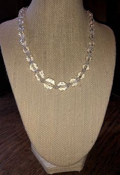 "Graduted crystal necklace, about 16\" long total chain length. I've been told these may be rock crystal, though I believe they are Austrian crystal. Very pretty. Sterling filigree stamped clasp and on chain. good vintage condition, showing gentle wear consistent with age. See pics and zoom in. Sold as found; priced accordingly. Strikingly lovely necklace. Make sure to view all photos and zoom in for details. Pictures are part of the description and it's assumed you've viewed them all." Gold Crystal Necklaces With Faceted Beads, Silver Beaded Crystal Necklace, Faceted Crystal Beaded Necklaces, Crystal Beaded Necklace With Faceted Round Beads, Crystal Faceted Beads Necklace, Gold Faceted Bead Crystal Necklace, Round Crystal Beaded Necklaces With Faceted Beads, Clear Crystal Beaded Necklaces, Costume Jewelry Crystal Necklace With Faceted Beads