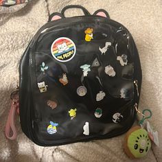 Custom Kawaii Pin Bag, Black Mini-Backpack With Cat Ears, Bag Is Brand New, Never Used, With Clear Vinyl Window On Front To Display Pinsi Hand Selected Pins For This Bag, As Well As Sanrio Zipper Pull, Cute Kawaii Kiwi Clip, And Fuzzy Bunny Id Holdermost Pins Are Enamel Pins, 2 Button Pins, Room To Add More From Your Own Collection! Decorated Backpack, Dragon Backpack, Pin Bag, Bucket Backpack, Minion Crochet, Ear Pin, Backpack Outfit, Cinch Bag, Birthday Inspo