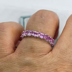 Anniversary Pink Sapphire Eternity Band With Prong Setting, Pink Sapphire Eternity Band With Prong Setting For Anniversary, Pink Sapphire Eternity Band, Elegant Pink Sapphire Round Eternity Band, Fine Jewelry Pink Sapphire Eternity Band With Prong Setting, Pink Sapphire Band, Ombre Rings, Color Wigs, Sapphire Eternity Band