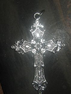 "You are looking a wholesale lot of 10  Cross PENDANTS .Each measures 2\" \"or 50mm tall x 36mm,not counting the jump ring.It has an antique silver tone finish and made of a lightweight zinc alloy.About 4 grams.Great detailed design for a necklace or to wear by itself.  The photo represents the actual pendants you will receive.They may vary slightly with minor flaws.More available.This is for 10 pendants." Pentagram Pendant, Gothic Cross, Gothic Crosses, Cross Design, Ball Pendant, Cross Designs, Cross Pendant Necklace, Cord Necklace, Pendant Set