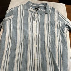 This Shirt Is Really Cool With A Heavy Material But It’s Too Big For Me. I Should Have Returned It But Waited Too Long. Never Worn. This Would Be Good For Somebody 250 -320 Lbs. And 6’ +. Light Blue Casual Vacation Shirt, Casual Light Blue Shirt For Vacation, Casual Striped Camp Shirt For Spring, Casual Striped Short Sleeve Collared Shirt, Casual Striped Collared Short Sleeve Shirt, Blue Cotton Short Sleeve Summer Shirt, Light Blue Relaxed Fit Short Sleeve Casual Shirt, Casual Fitted Short Sleeve Shirt For Vacation, Fitted Casual Short Sleeve Shirt For Vacation