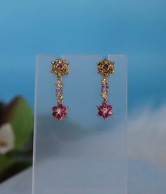 These are beautiful earrings to wear and enhance any outfit! Multicolor Cubic Zirconia Crystal Earrings Gift, Multicolor Cubic Zirconia Earrings, Dangling Earrings, Multi Stone, Cz Stone, Christmas Sale, Flower Earrings, The Light, Beautiful Earrings