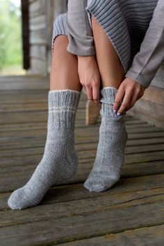 "Hand knitted socks is the winter's must have! Natural wool grants moisture absorption and warmth. Pure fabric is skin friendly and sustainable choice. Minimalist high quality boots socks will keep you toasty warm even being in the cold outside for hours. Breathable, so you do not worry about sweat, your feet will stay dry. These lightweight knit socks are made of natural sheep wool yarns. I need 1-3 business days to knit a pair of socks. Sizes EU / USA/CA ‣ XS 36-38 / 5.5 - 7.5 (22-23cm, 8-9\") Comfortable Knitted Gray Socks, Comfortable Knitted Winter Socks, Thick Comfortable Winter Socks, Cozy Round Toe Winter Socks, Comfortable Hand Knitted Winter Socks, Comfortable Thick Winter Socks, Snug Gray Winter Socks, Gray Winter Outdoor Socks, Gray Outdoor Winter Socks