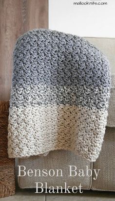 a crocheted blanket sitting on top of a couch