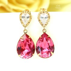 "Pink Earrings Gold Earrings Fuchsia Earrings Hot Pink Earrings Swarovski Crystal Cubic Zirconia 16k Gold Plated Magenta Earrings Beautiful, romantic and sparkling Swarovski Hot Pink Teardrop Crystal and Gold Earrings. The versatile crystal emits classic romance with its elegant and timeless, yet modern, appeal. I made these gorgeous Earrings with: - 18x13mm genuine Rose Pink Swarovski teardrop pear shaped fancy stones, set in gold plated settings - Hypoallergenic and tarnish resistant, 16k gold Pink Elegant Clip-on Earrings For Anniversary, Pink Clip-on Dangle Jewelry, Pink Dangle Clip-on Jewelry, Pink Teardrop Crystal Earrings For Pierced Ears, Pink Earrings For Anniversary, Pink Clip-on Earrings As Gift, Elegant Pink Clip-on Earrings For Anniversary, Pink Clip-on Jewelry For Party, Pink Clip-on Jewelry For Anniversary