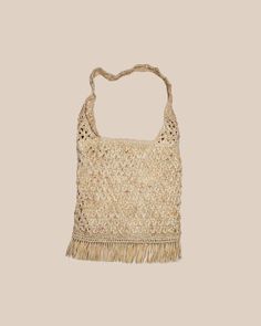 "Handwoven Shoulder Bag Material(s): raffia Dimension(s): 13\" W x 15\" H, 27\" total height with straps  Detail(s): star pattern weave with 2.5\" bottom fringe, lined with small inside pocket, and zipper closure" Spring Beige Shoulder Bag With Fringe, Beige Fringe Shoulder Bag For Spring, Spring Beige Fringe Shoulder Bag, Brown Fringe Tote Beach Bag, Summer Market Shoulder Bag With Adjustable Strap, Summer Beige Bag With Weaving Detail, Summer Market Bag With Adjustable Strap, Summer Beige Woven Bag, Rectangular Fringe Bucket Bag For Travel