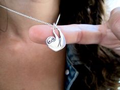 "This cute little sloth necklace is made from sterling silver and measures about 5/8ths of an inch tall and wide. Shipped as the charm only or on your choice of silver-plated or sterling silver cable chain in either 16\", 18\", or 20\". Please use the drop down menu for your options. The third photo shows the small sloth (this listing) next to the large sloth for comparison. To see the larger version: https://www.etsy.com/listing/105979978/sloth-necklace To see the mother-daughter set: https://w Cute Nickel-free Sterling Silver Necklaces, Cute Silver Jewelry With Adjustable Chain, Silver Novelty Necklaces With Charms, Novelty Silver Necklaces With Charms, Adjustable Sterling Silver Dangle Charm Necklaces, Adjustable Silver Novelty Jewelry, Adjustable Dangle Charm Necklaces In Sterling Silver, Adjustable Hypoallergenic Sterling Silver Charm Necklace, Novelty Hypoallergenic Jewelry For Everyday