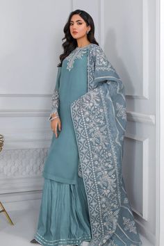 Women's party wear designer pure chiffon suit in light blue color. Fully Stitched with lining 3 piece Orignal Pakistani Designer Suit - same product as show in the picture. Ready to ship from California Product Info:Includes: Shirt, Trouser And Dupatta With AccessoriesColor: Blue ColorMaterial: Pure Chiffon Work: Embroidered Chiffon Front, Plain Chiffon Back, Plain TrousersSleeves: Embroidered Chiffon SleevesBottom: Dyed Silk TrousersDupatta: Embroidered Cotton Pati Organza 2.60 YardFit: True to Sharara Party Wear, Chiffon Sharara, Light Blue Party, Phulkari Pants, Long Kameez, Lucknowi Kurta, Chiffon Suit, Patiala Salwar Suits, Bridal Dupatta