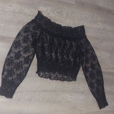 Never Worn / No Tags Color: Black 100% Nylon Longsleeve Sheer Lace Elastic Waistband Off Shoulder Elastic Stretch Casual Long Sleeve Lace Top, Casual Long Sleeve Stretch Lace Top, Black Long Sleeve Lace Top For Fall, Casual Black Lace Blouse, Black Casual Lace Top For Fall, Casual Black Lace Top For Fall, Black Lace Top For Fall, Black Fitted Long Sleeve Lace Top, Fitted Black Lace Top With Long Sleeves