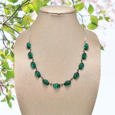 "Exquisite vintage flawed emerald glass & rhinestone necklace. 11 large emerald green art glass high domed cabochon stones set with fancy prongs, accented by tiny clear diamanté rhinestones for this amazing design. The elongated cable chain and spring ring are sterling silver, while the stone settings appear to be a silver plate.  Marked:     Sterling (on the clasp) Measurements:   21\" maximum wearable length, each cabochon measures 5/8\" x 1/2\". Condition:    Beautiful vintage condition....  No missing stones, but all the tiny rhinestones in between the emerald cabs are dark. I'm sure they are supposed to be clear and bright, which these are not. Please look close at the pictures. Stunning piece! I try to find and tell you about any imperfections I see Please be aware that close-ups exa Emerald Green Art, Cartier Necklace, Vintage Rhinestone Jewelry, Necklace Green, Bib Necklaces, Eye Earrings, Pink Art, Green Art, Green Emerald