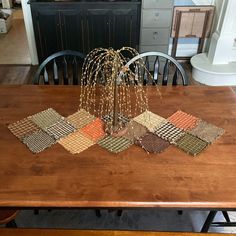 a wooden table topped with lots of place mats