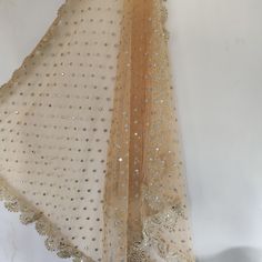 More dupatta here in our collection https://www.etsy.com/shop/neelcreations/?section_id=15880219 Net with embroidery Indian dupatta. It has beautiful golden border. Scallop border with dull gold color. ★ The mirror on all over net is not real. ★ It can be made in other colors and longer in length also. We can also change the border if you want. Approximate length 88-90 inches. We can increase length so please contact us if you want longer dupatta. These designer dupattas are very much in trend. Elegant Luxury Dupatta With Border, Luxury Slub Silk Dupatta With Border, Luxury White Shawl Dupatta, Luxury Chikankari Embroidery Party Dupatta, Luxury Gold Tissue Silk Dupatta, Semi-stitched Lace Saree With Sheer Dupatta, Festive Lace Anarkali Set With Sheer Dupatta, Lace Dupatta For Diwali Party, Lace Dupatta For Festivals