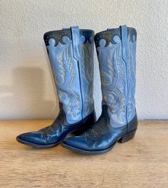 Vintage 1992 Rios of Mercedes for Billy Martins NYC Women's Cowboy Boots- Size 8-1/2M.  Measurement from heel to toe-bottom of boot is 11-1/4 inches. Sky Blue with bright navy trim. Excellent condition. Includes original box. Amazing comfort and form fitting thick leather sole. Some scuffs on toes and 1 scuff on back of right heel-see photos. Measurements flat: Outside ankle width 5-1/2"W, Calf outside width 6-1/2"W, Heel height overall from back 1-1/4"H, Height from base of heel to top of boot Blue Snip Toe Boots With Reinforced Heel, Western Blue Leather Heeled Boots, Blue Leather Western Heeled Boots, Western Style Blue Leather Heeled Boots, Blue Fitted Snip Toe Boots, Fitted Blue Snip Toe Boots, Western Style Blue Boots With Square Toe, Blue Leather Heeled Boots With Snip Toe, Vintage Blue Leather Boots