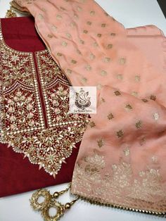 Item Overview ATHARVA Hand Embroidered Salwar Kameez w/EmbroideredNeck on Maroon/Banarsi Silk Dupatta/ Customized Stitching/Wedding/CH1128 Fabric: * Shirt Chanderi Silk- 2.5 Mts - with Hand Embroidered Neck * Dupatta: Banarsi Silk Dupatta (Motifs may wary) * Bottom Santoon Silk 2.5 Mts. Excusive Hand Embroidered Party Wear Punjabi Suit. Customization: * Fabrics: Designs Can be made in different Fabrics. * Stitching Available Care: * Dry Clean/ Avoid direct Ironing on Embroidery Part. * Lining is Semi-stitched Banarasi Silk Sharara With Dabka Work, Embroidered Self-design Chinon Fabric, Wedding Churidar With Dupatta In Jamawar, Designer Embroidered Banarasi Silk Sharara, Semi-stitched Chinon Salwar Kameez With Intricate Embroidery, Intricate Embroidery Shantoon Kurta For Wedding, Wedding Kurta With Intricate Embroidery In Shantoon, Eid Traditional Wear With Intricate Embroidery In Shantoon, Wedding Dupatta With Intricate Embroidery In Shantoon