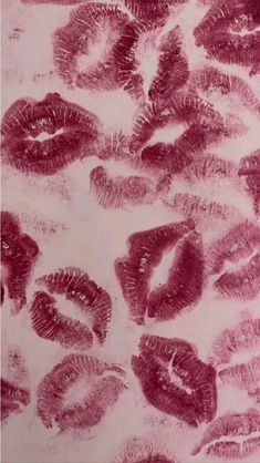 red lipstick imprints on a white background