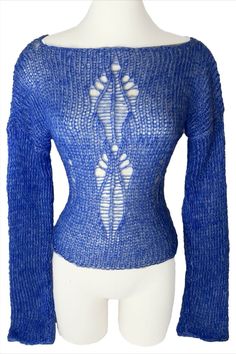 The Sapphire Top is a one of kind top that has open stitches that create a symmetrical design. #knitting #knit #knitwear #knittersofinstagram #knitstagram #knitted #knittingaddict #knittinglove #knitter #knits #knitters #knittersoftheworld #knitwears #knitlove #knittersofig #knittinginspiration #knithat #knittingpattern #knitaddict #knitsweater #knitt #knitlife #knittedhat #knitdress #knitsagram #knitspiration #knittersgonnaknit #KnittedSweater #knitdesign #knitweardesign Stretch Blue Knit Top For Winter, Blue Fitted Textured Knit Sweater, Blue Stretch Knit Top, Blue Pointelle Knit Top For Fall, Blue Knit Stretch Sweater, Fitted Blue Knit Top, Blue Stretch Knit Sweater, Blue Stretch Knit Top For Spring, Stretch Knit Hollow Out Tops