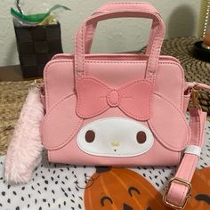 The Cutest Thing Ever Statement Bags Just Dropped Sanrio Originals! Get Yours Today! Awesome Quality Fits My Phone (Iphone 12 Pro Max), Keys And Mini Card Wallet With A Mascara And 2 Lipsticks Cute Pink Satchel Bag, Kawaii Rectangular Portable Shoulder Bag, Kawaii Rectangular Mobile Phone Bag, Kawaii Portable Rectangular Shoulder Bag, Portable Rectangular Kawaii Shoulder Bag, Cute Portable Pouch Satchel, Cute Pink Shoulder Bag Satchel, Cute Portable Satchel For Gift, Pink Rectangular Portable Satchel