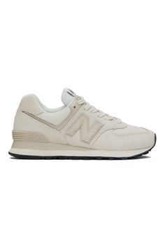 New Balance: Off-White 574 Sneakers | SSENSE New Balance Sporty Beige Sneakers, Sporty Beige New Balance Sneakers, New Balance Beige Sneakers With Rubber Sole, Classic Cream Sneakers For Streetwear, Off-white Sneakers For Streetwear, Cream Suede Sneakers For Streetwear, Beige Sneakers With Perforated Toe Box For Streetwear, Classic Beige Sneakers For Streetwear, Classic Off-white Sneakers For Streetwear