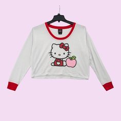 Hello Kitty Apple Skimmer Long-Sleeve Pajama Top Pullover Kawaii Women Size S Flaws: Has A Subtle Dust Smear In The Front (Shown In The Photos). Overall, It's In Great Condition. Material: Polyester, Nylon, And Spandex Features: Scoop Neck Jumbo Print Relaxed Fit Oversized Y2k, Cosplay, Sanrio, Anime, Comfy, Soft, Relaxation, Casual, Cottage, Cozy All Seasons Knit, Colorblock Made In Imported Machine Wash Size: S Measurements Taken Flat: Length 18.25 In Pit-To-Pit 22.5 In Armpits 7.75 In Sleeve Cute Long Sleeve Fitted Sleepwear, Cute Fitted Long Sleeve Sleepwear, Playful Red Tops For Loungewear, Casual Cartoon Print Sleep Top, White Cartoon Print Sleep Top, Casual Sleep Tops With Cartoon Print, Red Long Sleeve Tops For Pajama Party, Long Sleeve Cartoon Print Bedtime Tops, Long Sleeve Bedtime Tops For Fall