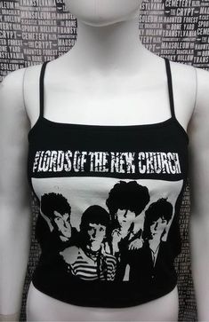 This is a black sleeveless Lords of the New Church cropped tank top.This has a Lords image screen printed on the front. 95% cotton/ 5% SpandexThese are handmade screenprinted and slightly vary from the photo. Please feel free to email me any questions. Thanks for looking.Due to an influx of incorrect addresses if a package is returned,  you must pay the shipping cost to resend the item to you.I do not do exchanges and I do not take returns unless the item is damaged. I thoroughly check each item Fitted Graphic Print Tank Crop Top, Fitted Graphic Print Emo Tops, Emo Black Top For Festival, Fitted Punk Vest Top, Gothic Crop Top For Concerts, Gothic Tank Top For Streetwear, Fitted Alternative Vest Top, Fitted Alternative Style Vest Top, Fitted Graphic Print Tank Top For Alternative Fashion