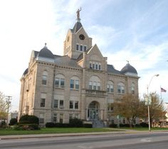 an old building with a steeple on the top